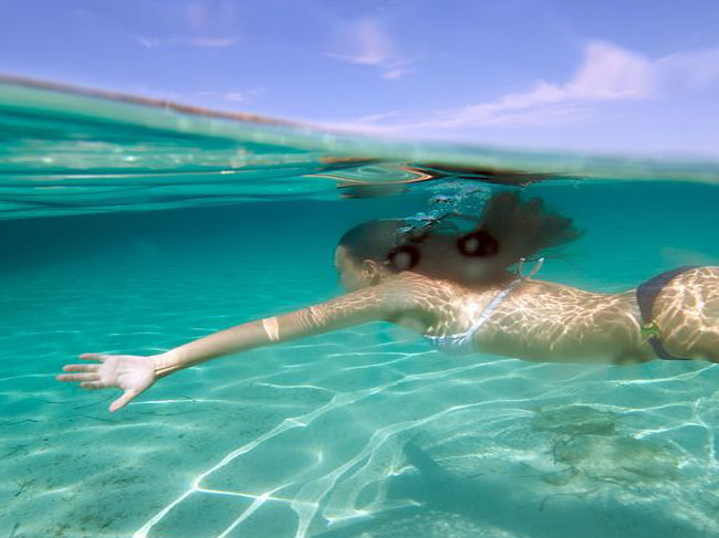 Playing In Ocean