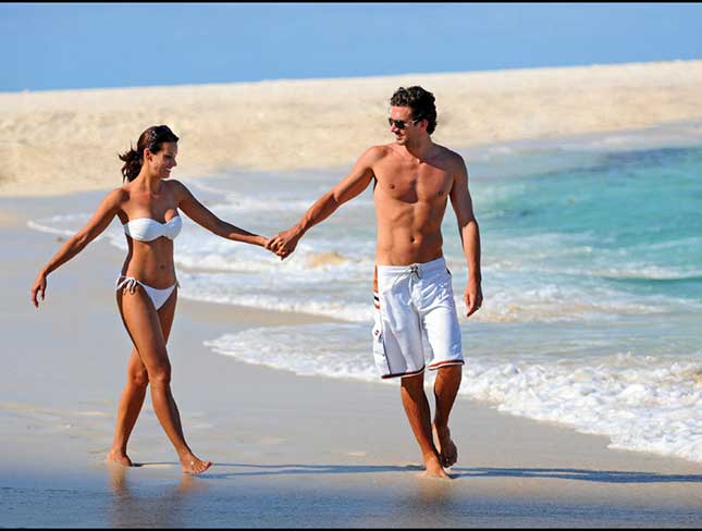 Couple Walking on Beach